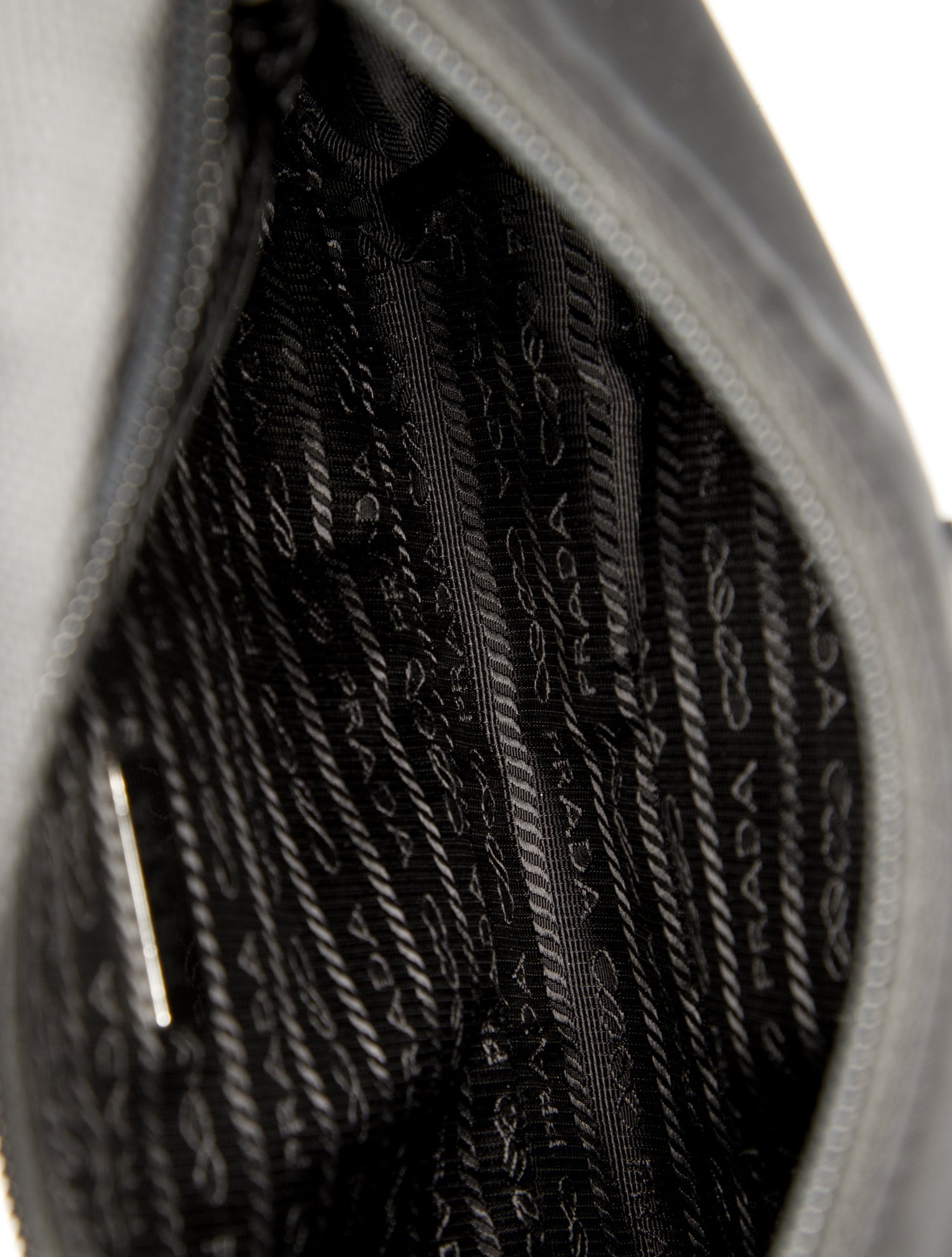 Prada Enameled Metal Triangle Re-Edition 2000